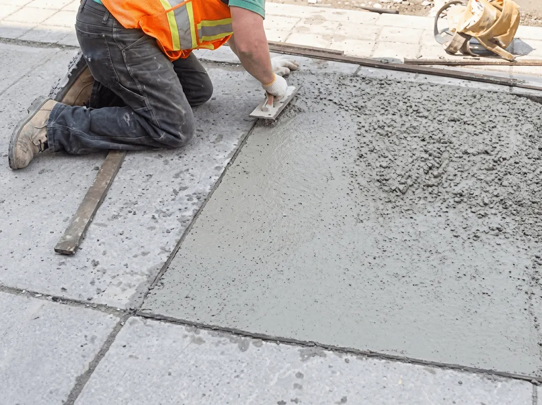 Professional repairing a concrete floor in Little Rock, AR